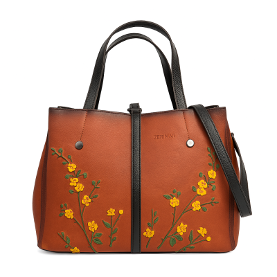 Bolsa de couro com alças...